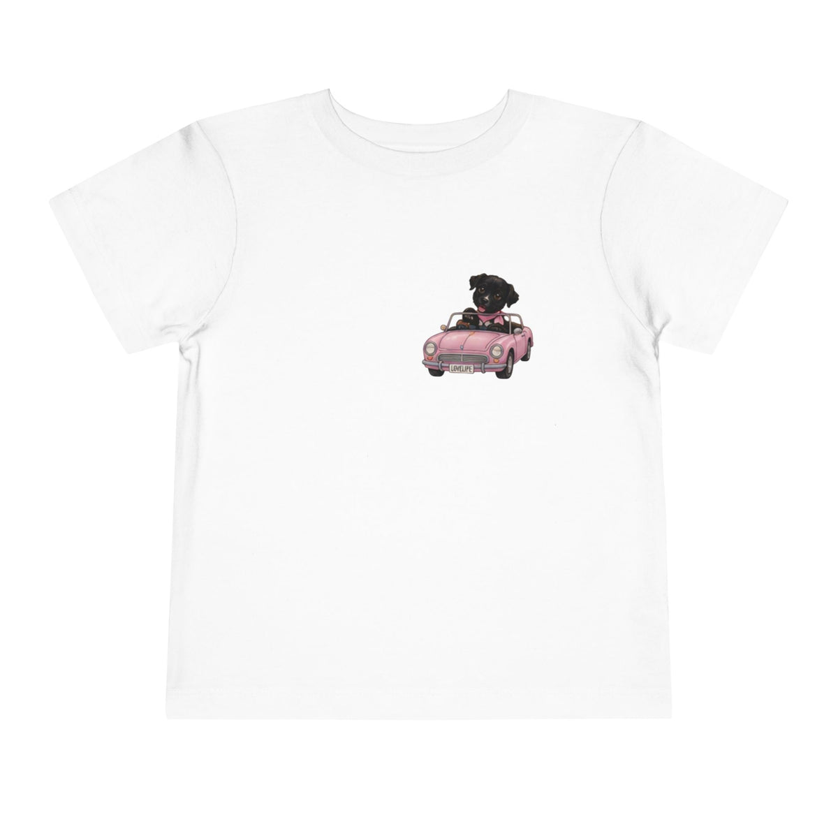 Toddler Tee — Cute Black Dog in Pink Car with "Dream. Believe. Love." Back Print