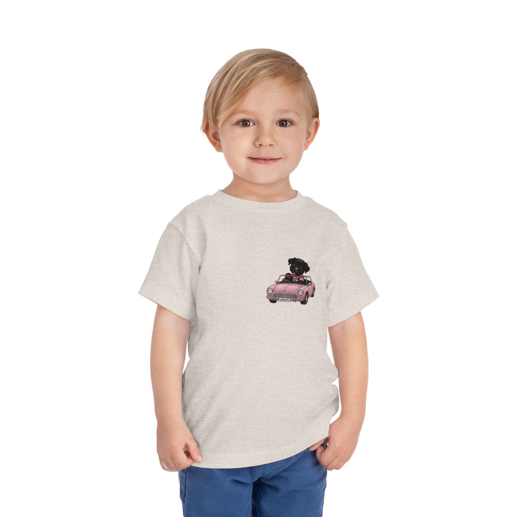 Toddler Tee — Cute Black Dog in Pink Car with "Dream. Believe. Love." Back Print