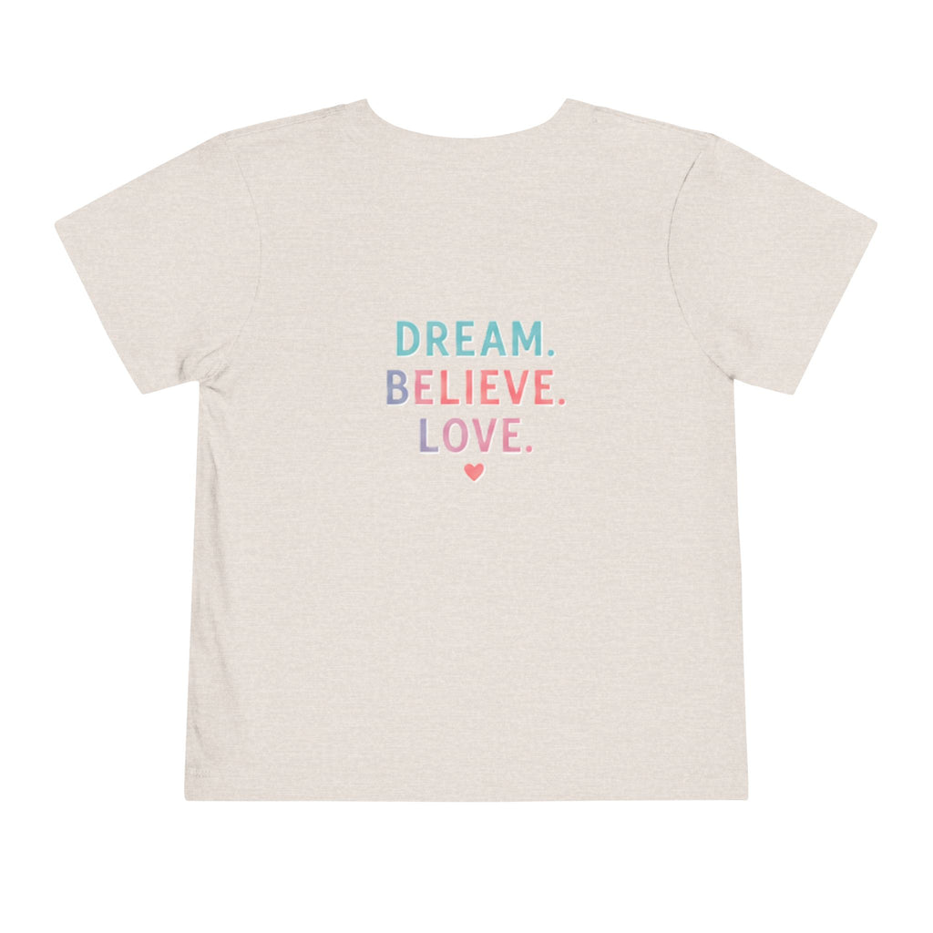 Toddler Tee — Cute Black Dog in Pink Car with "Dream. Believe. Love." Back Print