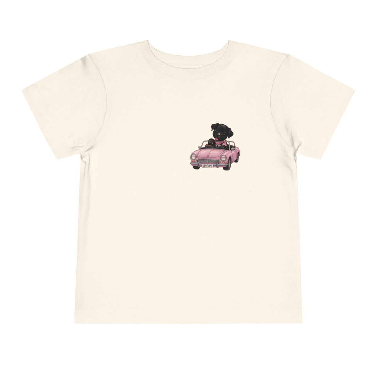 Toddler Tee — Cute Black Dog in Pink Car with "Dream. Believe. Love." Back Print