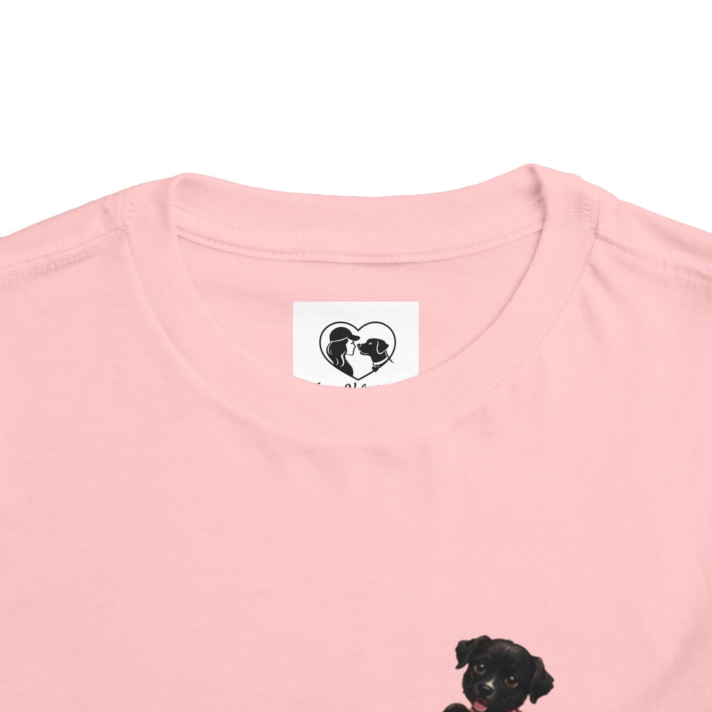 Toddler Tee — Cute Black Dog in Pink Car with "Dream. Believe. Love." Back Print