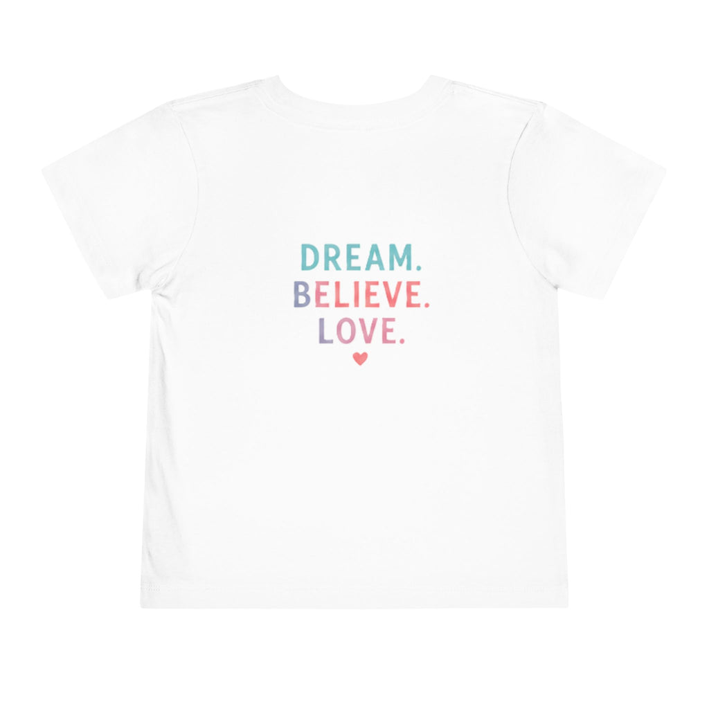 Toddler Tee — Cute Black Dog in Pink Car with "Dream. Believe. Love." Back Print