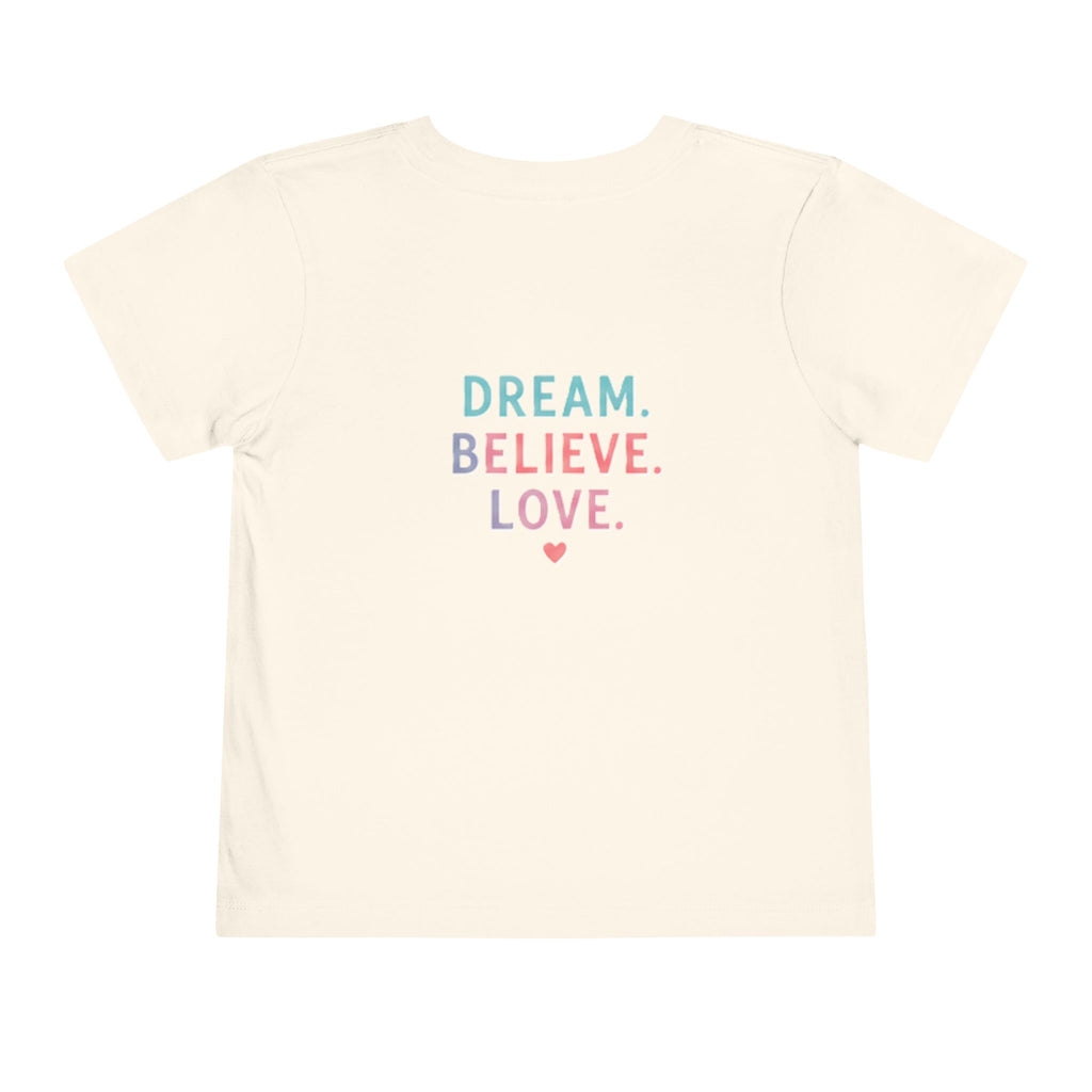 Toddler Tee — Cute Black Dog in Pink Car with "Dream. Believe. Love." Back Print