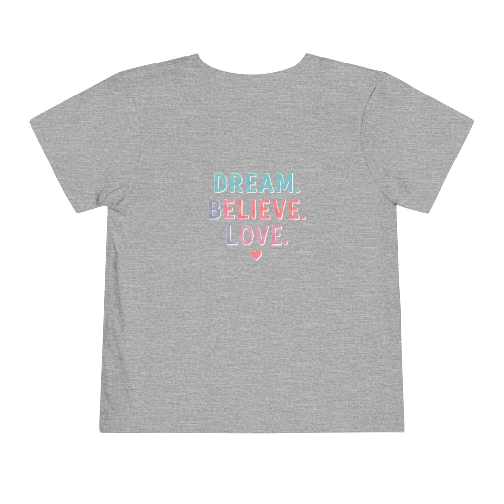 Toddler Tee — Cute Black Dog in Pink Car with "Dream. Believe. Love." Back Print