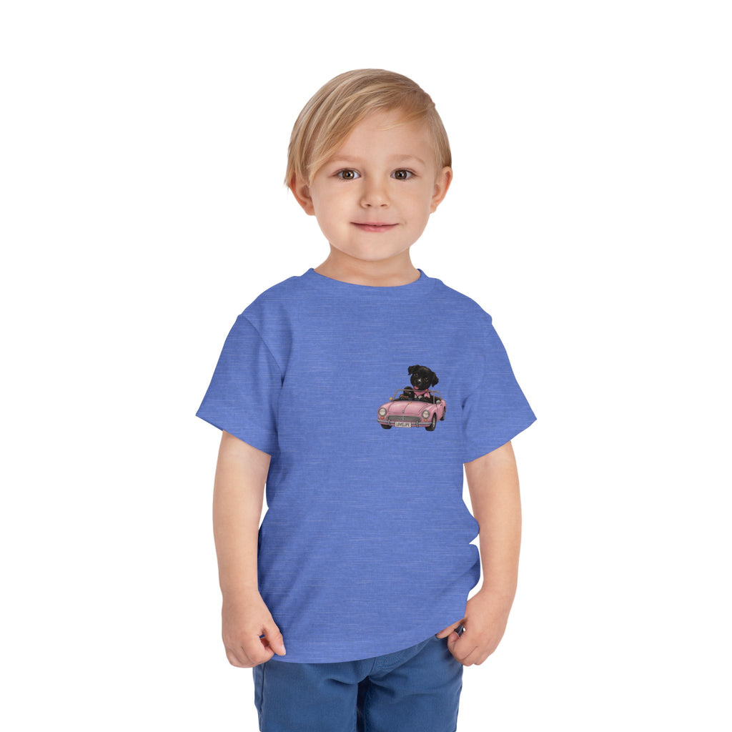 Toddler Tee — Cute Black Dog in Pink Car with "Dream. Believe. Love." Back Print