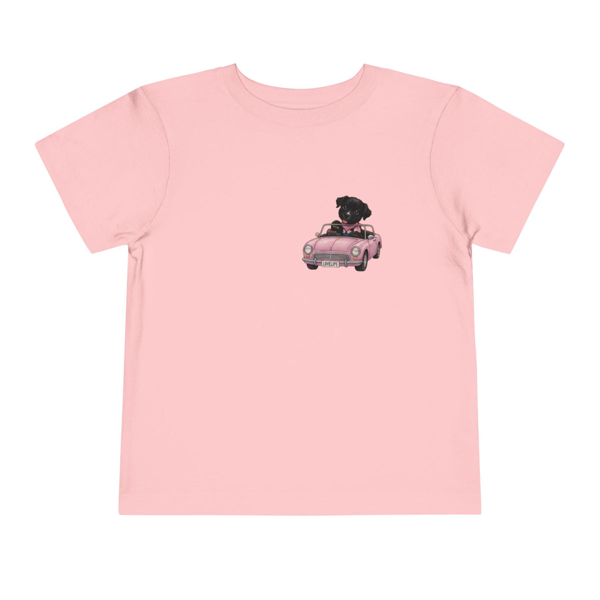 Toddler Tee — Cute Black Dog in Pink Car with "Dream. Believe. Love." Back Print